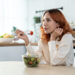 woman eating healthy foods
